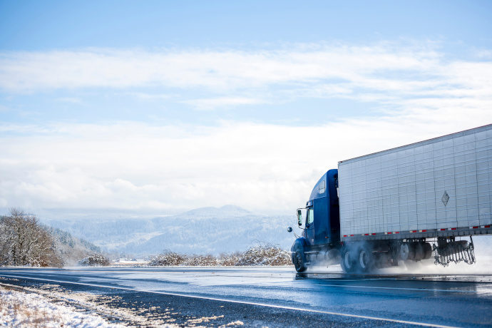 Semi Truck Driving in Winter on Icy Roads
