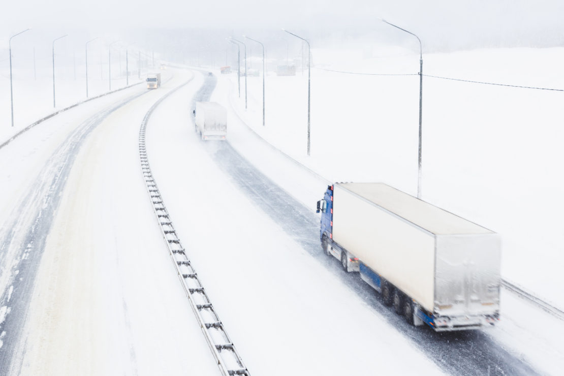 Truck driving in poor weather conditions